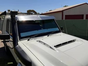 sun visor fuel economy wind noise
