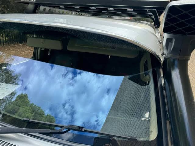 A properly contoured sun visor leaves ample clearance for the snorkel tube