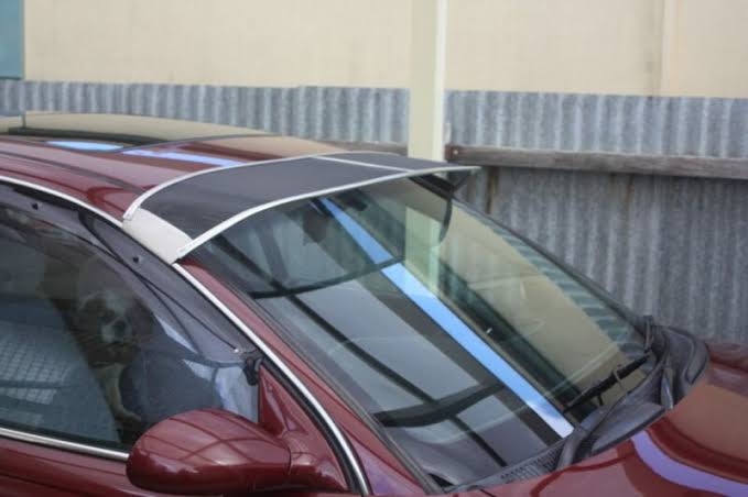 Alloy mesh sun visor fitted to an aerodynamic VT VZ Commodore